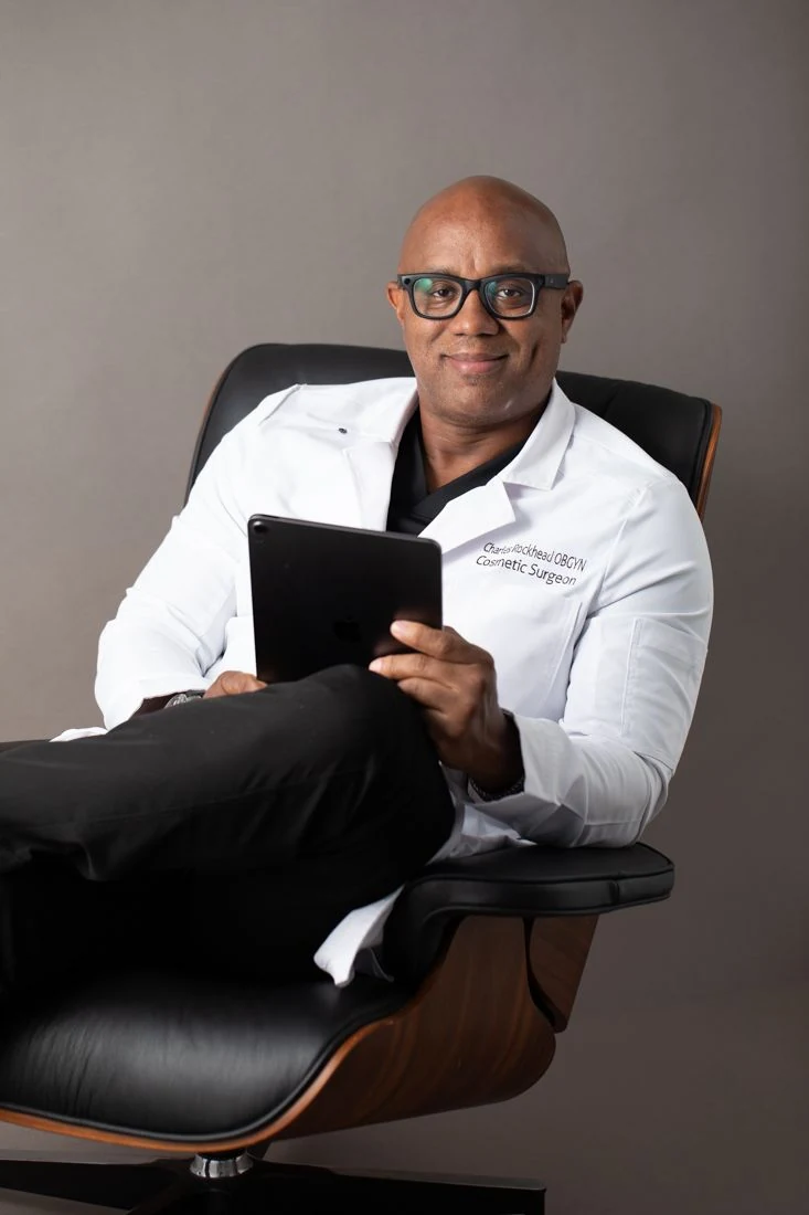 Portrait of Dr. Charles Rockhead, board-certified OB/GYN and Medical Director of Oshun Cosmetic Services in Kingston, Jamaica